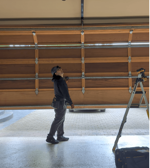 Northbridge technician repairing garage door opener